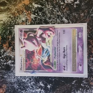 Mewtwo pokemon card plus 25 other pokemon cards included. Suprise pack.